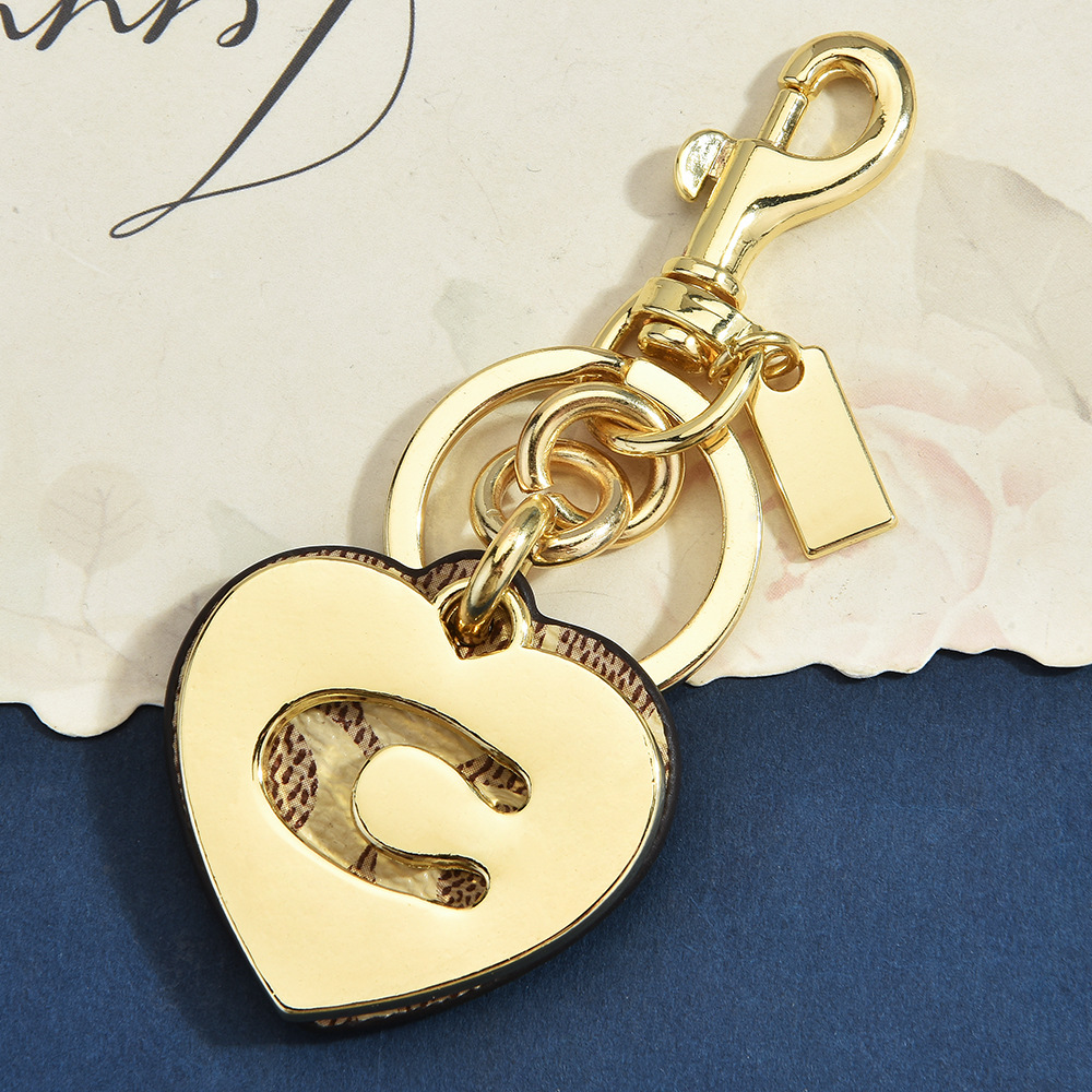 Monogram Heart Flower Bag Char - đánh giá và giá Monogram Keychain Leather